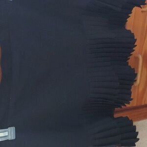 Nine West Suit Mini Skirt. Size 8 . black lined. Pleated at the bottom